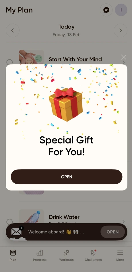 A wellness app showing a 'Special Gift For You' popup after onboarding