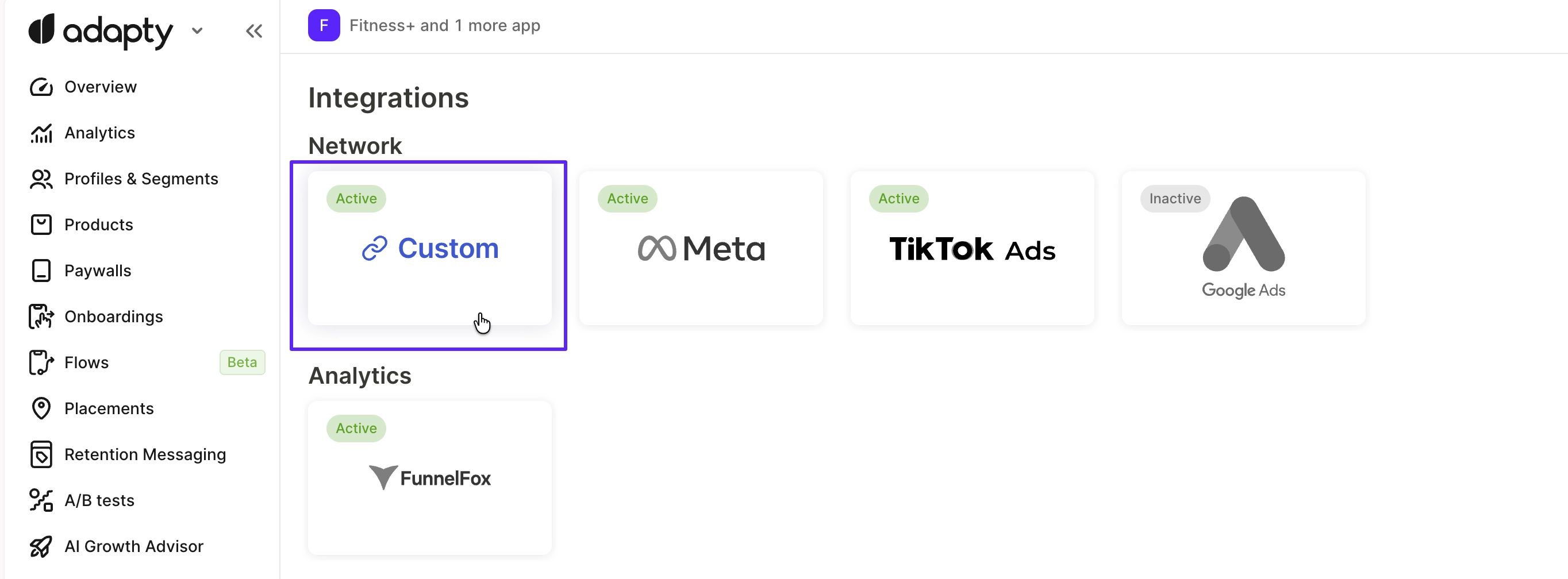 Integrations page in Adapty Attribution with the Custom card highlighted in the Network group