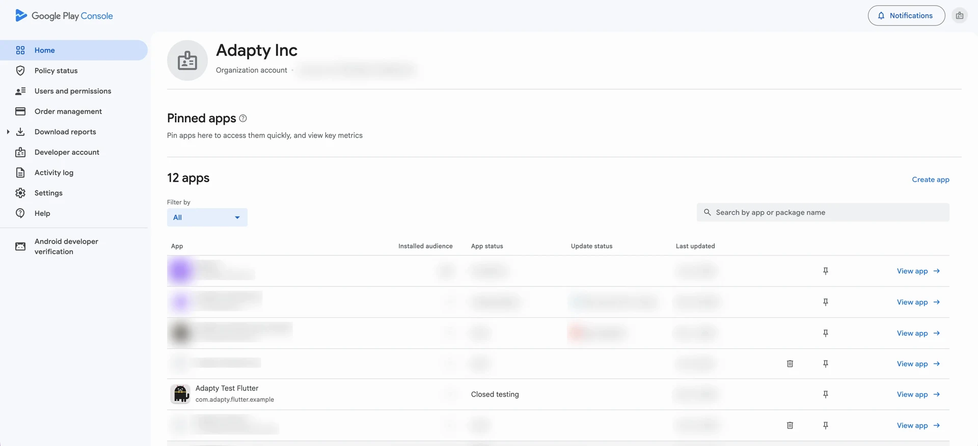 Users and permissions page in Google Play Console with the Invite new users button