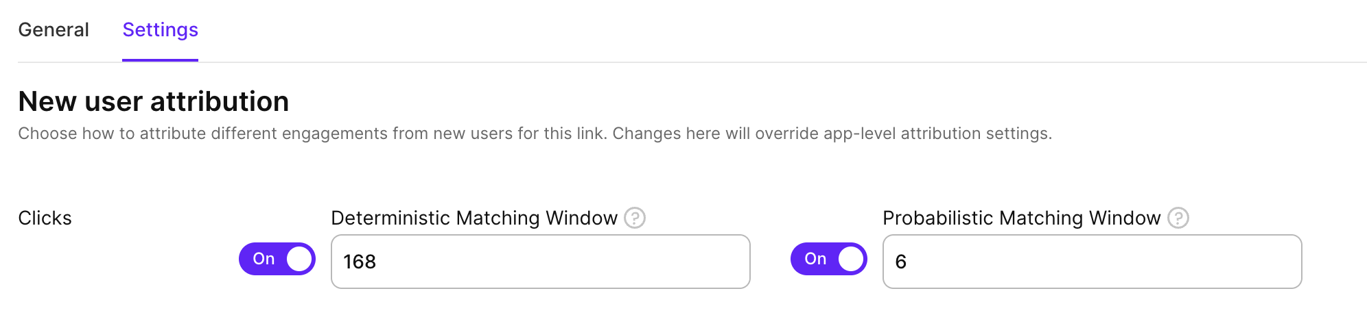 New user attribution section on the Settings tab, with the deterministic and probabilistic matching windows and their on/off switches